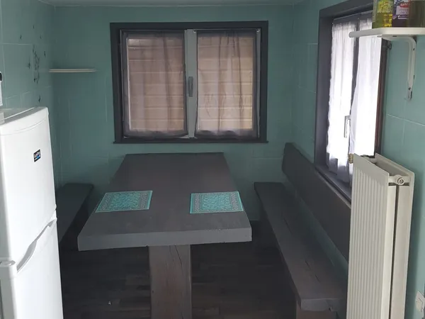 The dining corner of the shared kitchen